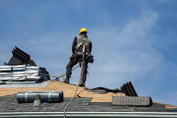 Professional Gutter Installation technician working in Holtsville, NY